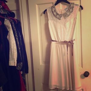 Cute beige dress for special occasion